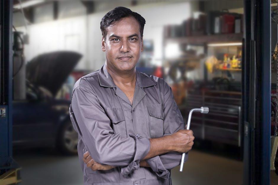 Professional auto glass technician examining a vehicle windshield